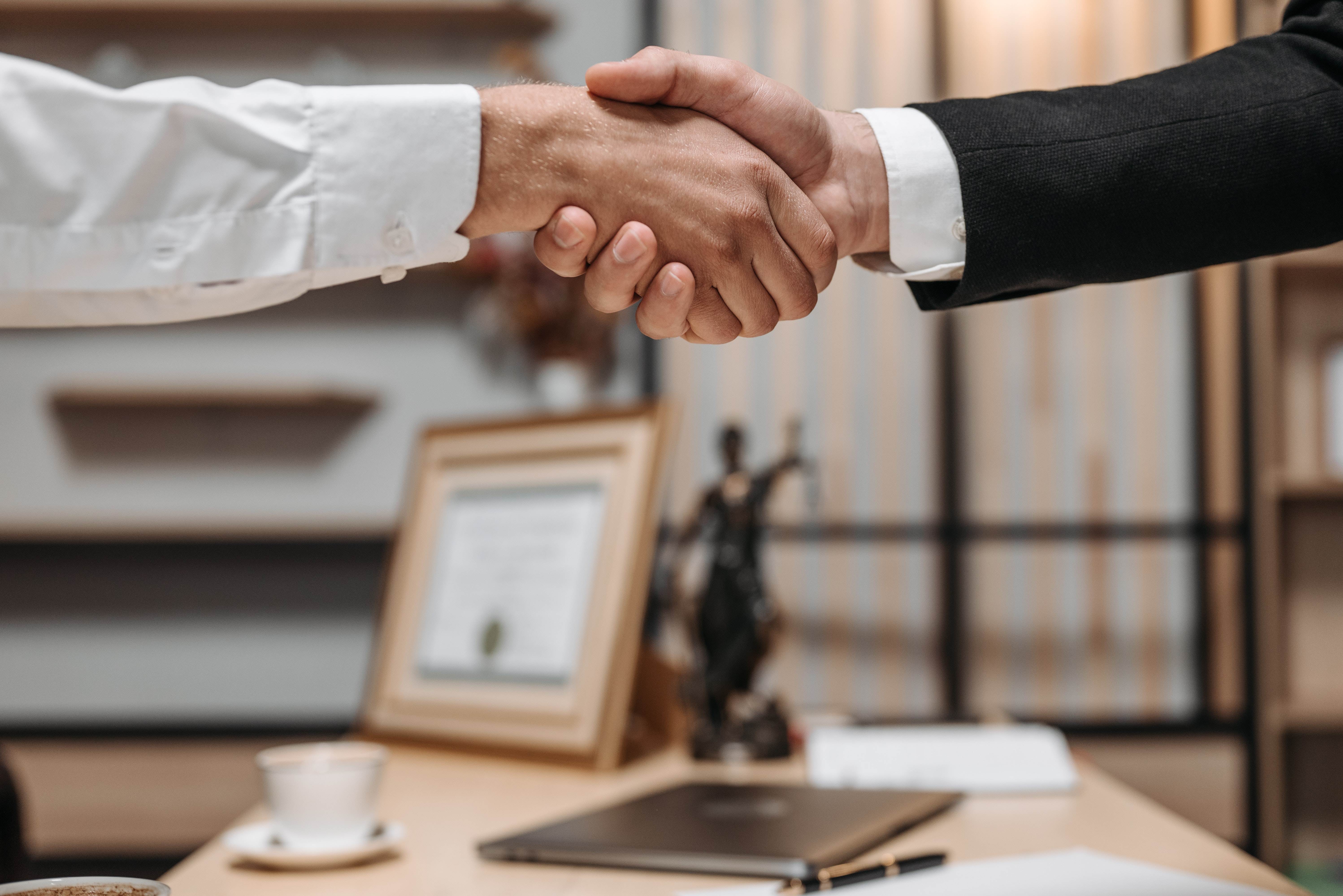 Lawyer and Client Shaking Hands